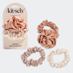 Set of Terracotta satin scrunchies with packaging labeled 'kit-sch' on a grey background