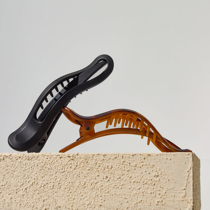 KITSCH Black Tort Curved Flat Lay Claw Clips 2pc — creative product shoot