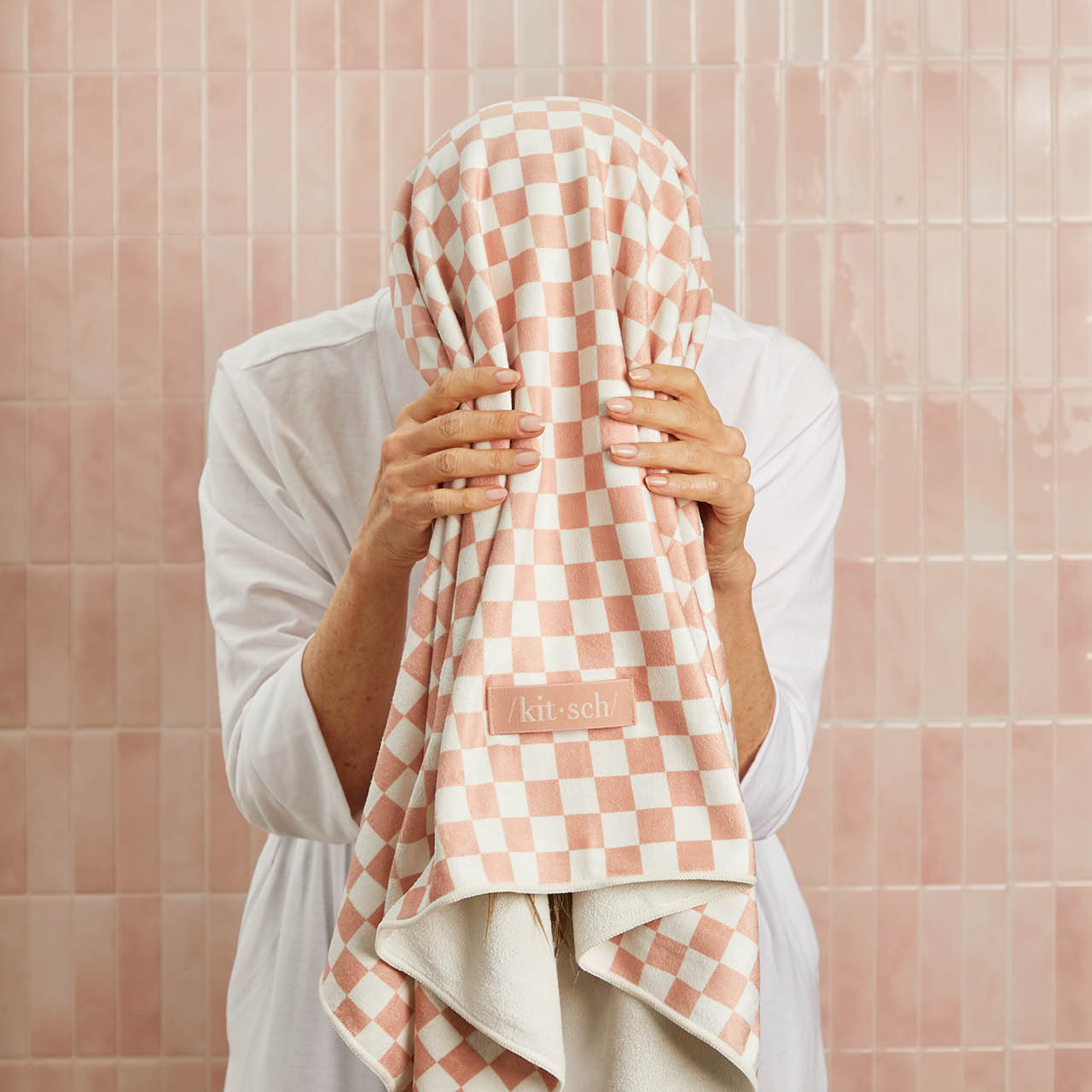 KITSCH Terracotta Checker XL Quick-Dry Hair Towel Wrap — in-use lifestyle shot — wrapped on wet hair — ultra-absorbent microfiber cuts drying time while protecting the hair cuticle