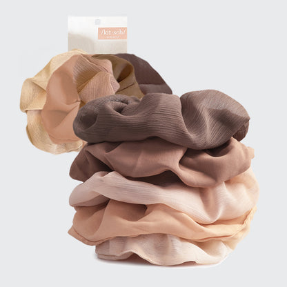 KITSCH Crepe Scrunchies in Terracotta — hero product shot — textured crepe fabric in warm terracotta tones — gentle snag-free hold for all hair types