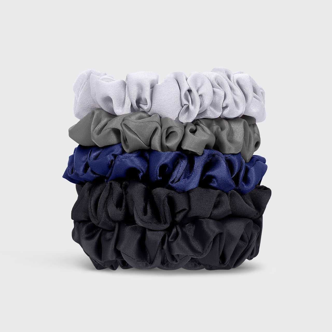 KITSCH Midnight Satin Petite Scrunchies 5pc Set — 5 midnight satin petite scrunchies stacked to show color palette — deep navy, black, and midnight blue tones