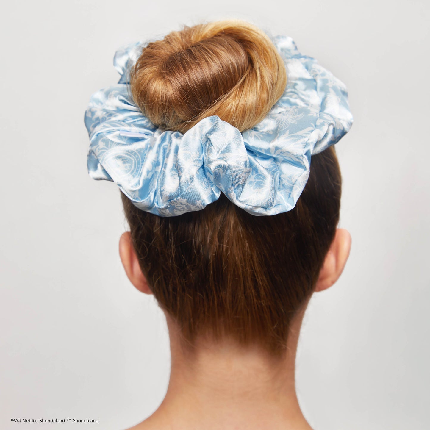 KITSCH Kitsch x Bridgerton Satin Pillow Scrunchies in Toile De Blue — model wearing Toile De Blue pillow scrunchie — silky construction won't crimp or damage hair overnight
