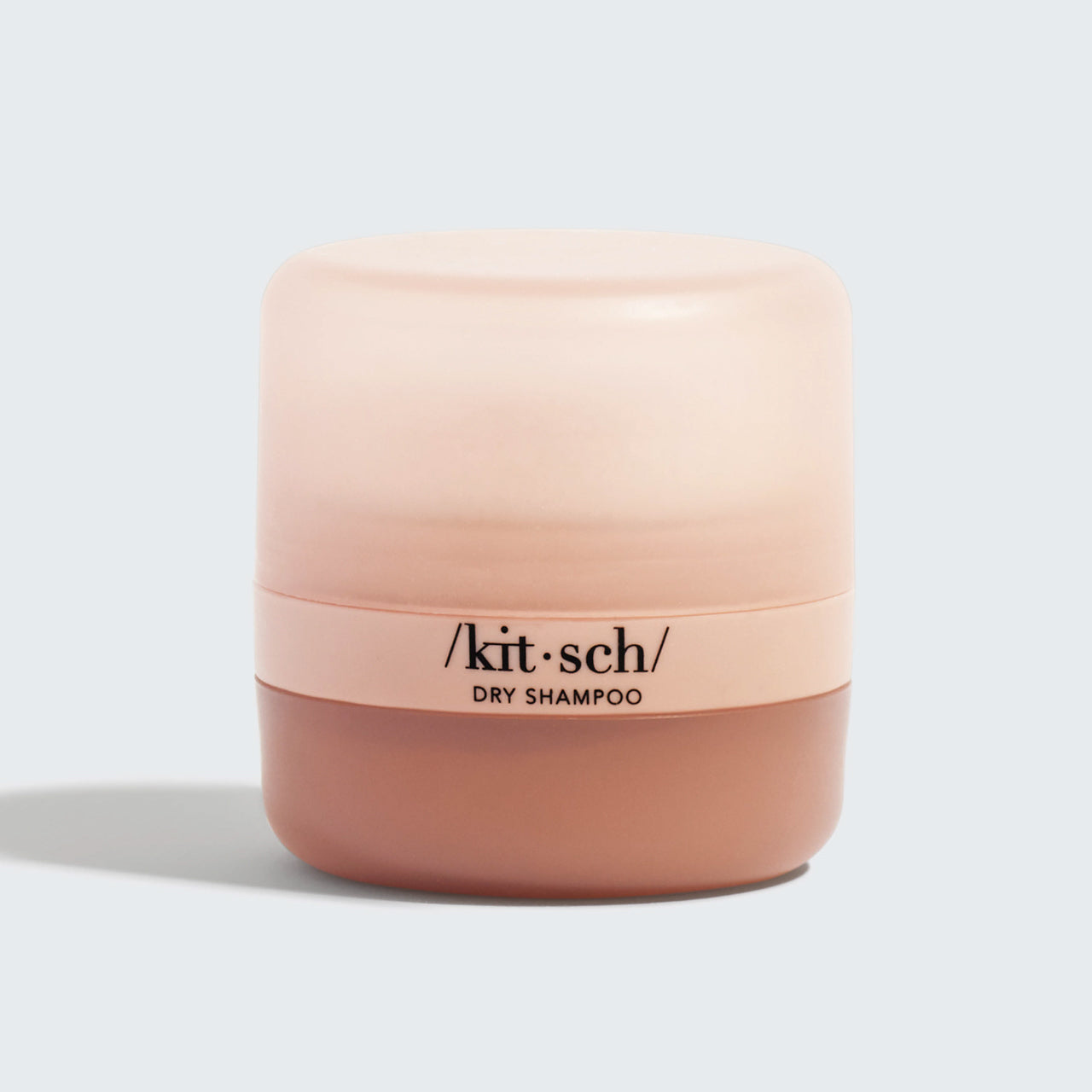 KITSCH Light Volumizing Rice Protein Dry Shampoo with Puff — product lifestyle shot — Packaging made from recycled plastic and recycled paper — travel-friendly design to refresh your look on-the-go