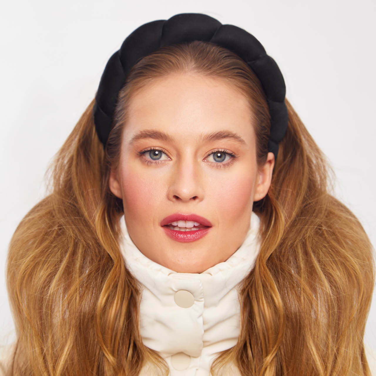 KITSCH Black Cloud Headband — model wearing black cloud headband for a polished look — super soft design keeps head (and hair!) in the clouds