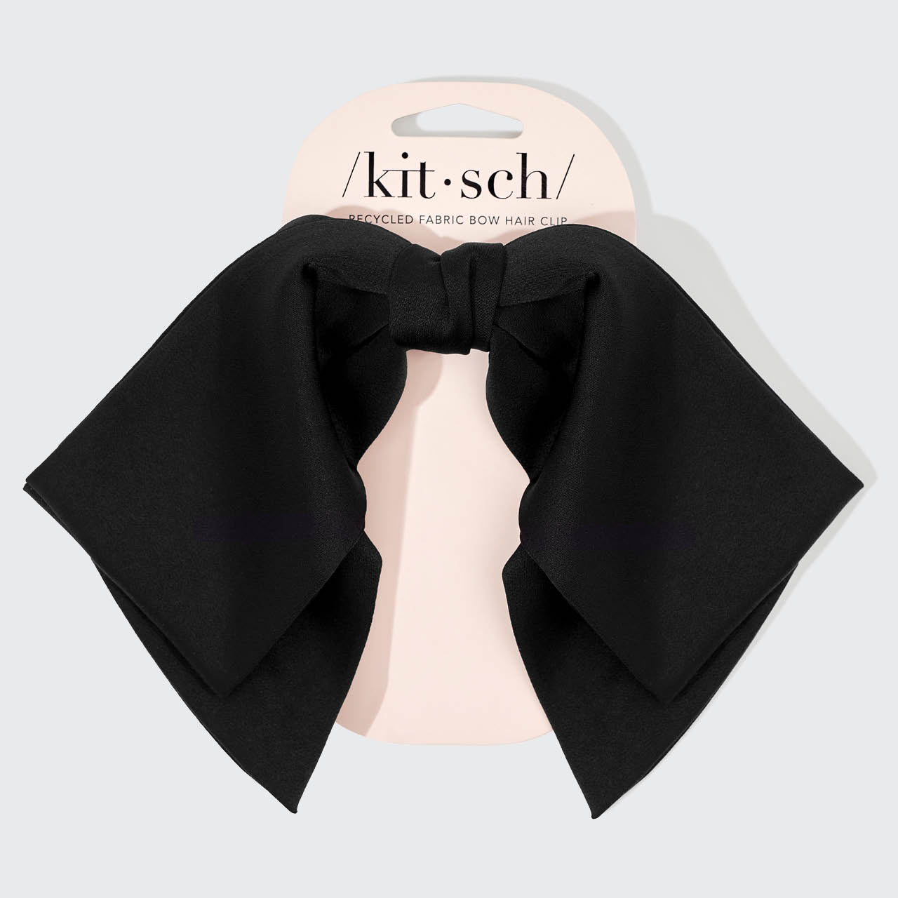 KITSCH Black Bow Hair Clip — packaging
