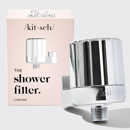 Chrome shower filter with 'kit·sch' branding and packaging on a light gray background