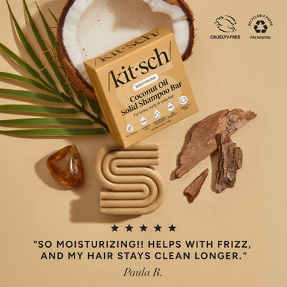 Kitsch Coconut Oil Solid Shampoo Bar with coconut and botanical ingredients beside a five-star customer review praising moisture, frizz control, and longer-lasting clean hair.