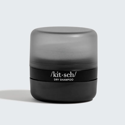 KITSCH Dark Volumizing Rice Protein Dry Shampoo with Puff — product lifestyle shot — Packaging made from recycled plastic and recycled paper — built-in puff for easy application to your roots