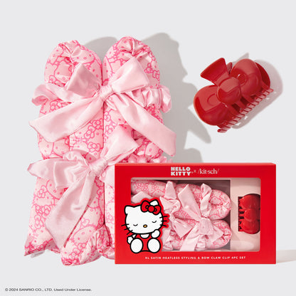 KITSCH Hello Kitty x KITSCH XL Satin Heatless Styling & Bow Claw Clip 4pc Set — hero product shot — full set on white background, Hello Kitty-print pink satin rod, bow clip and scrunchies