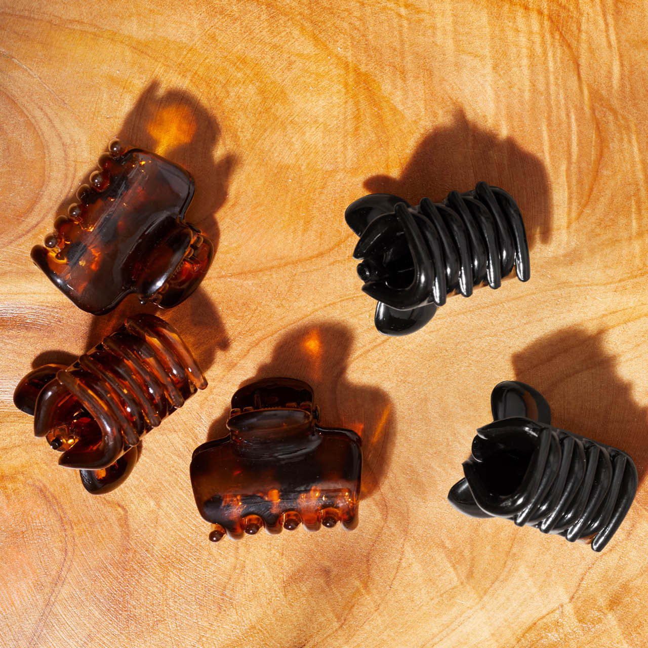 KITSCH Black Tort Mini Cloud Claw Clips 6pc — creative product shoot