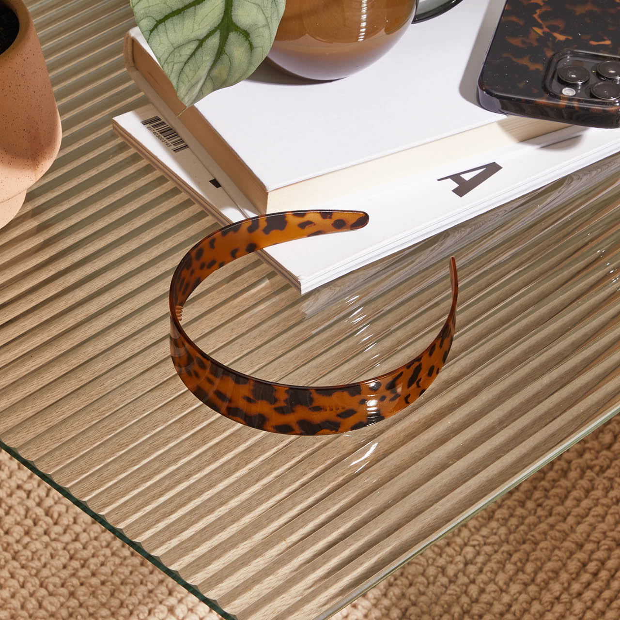 KITSCH Tort Wide Headband — creative product shoot of tort wide headband — vegan & cruelty-free, made from recycled plastic