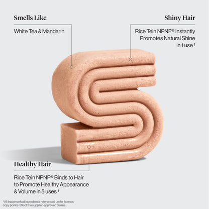 Kitsch Rice Water Shampoo Bar benefits diagram showing white tea and mandarin scent, Rice Tein NPNF for instant shine, and healthy hair volume - bio-based solid shampoo bar clinically proven to increase hair volume by 20% after 5 washes. For thin, fine, and damaged hair. Cruelty-free, made in USA, 100 washes, 3.2 oz / 91g.