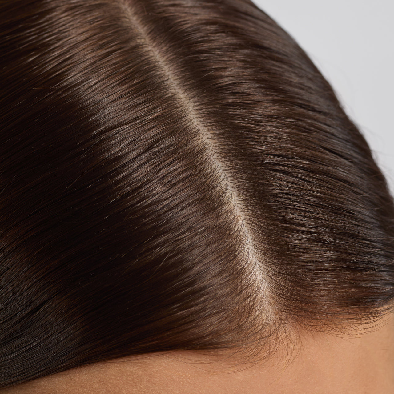 After image: improved hair fullness and scalp health after consistent use of KITSCH Rosemary & Biotin Scalp & Hair Oil with Massaging Applicator — visible results from scalp-first routine