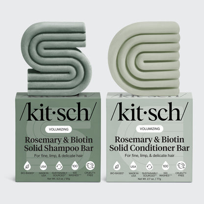 KITSCH Volumizing Rosemary & Biotin Solid Shampoo Bar 3.2oz & Conditioner Bar 2.7oz Combo on light gray background — both bars labeled VOLUMIZING, For fine, limp, & delicate hair — icons: Bio-Based, Made in USA, Sustainably Sourced, 100 Washes, Cruelty-Free — bottle-free solid bar set for fine, limp, and delicate hair