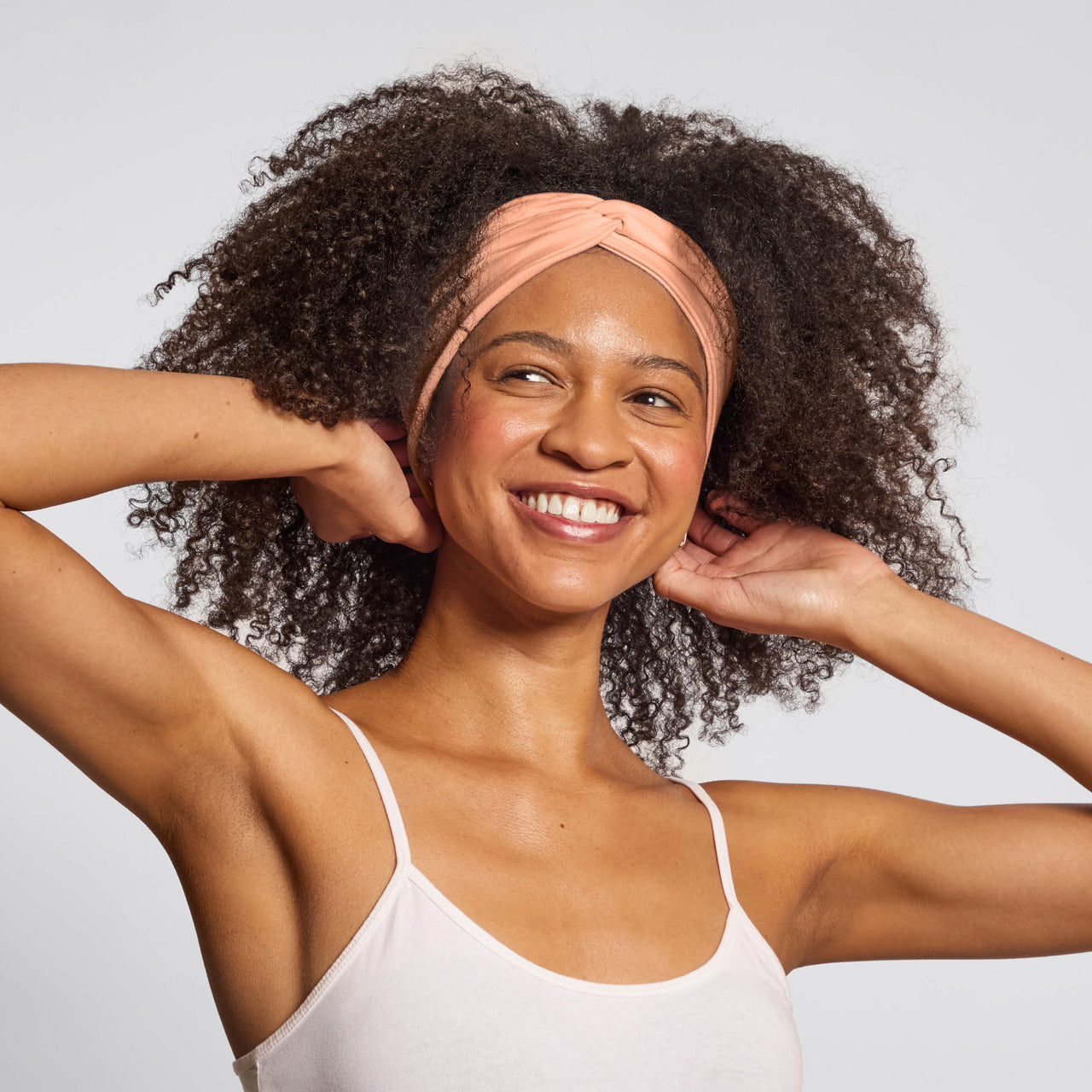 KITSCH Rosewood Wide Twist Headbands 2pc Set — lifestyle model shot with rosewood wide twist headband — 2-piece set in warm neutral rosewood tones, vegan & cruelty-free