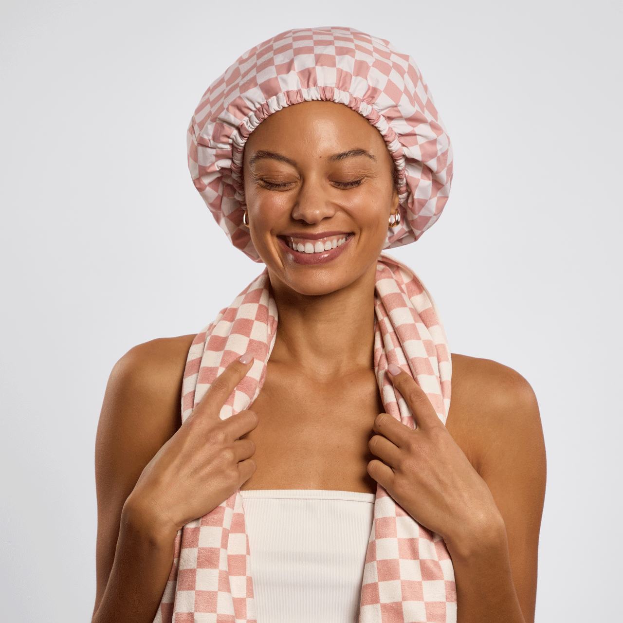 Kitsch Flexi Shower Cap and XL Hair Towel set styled with bathroom essentials