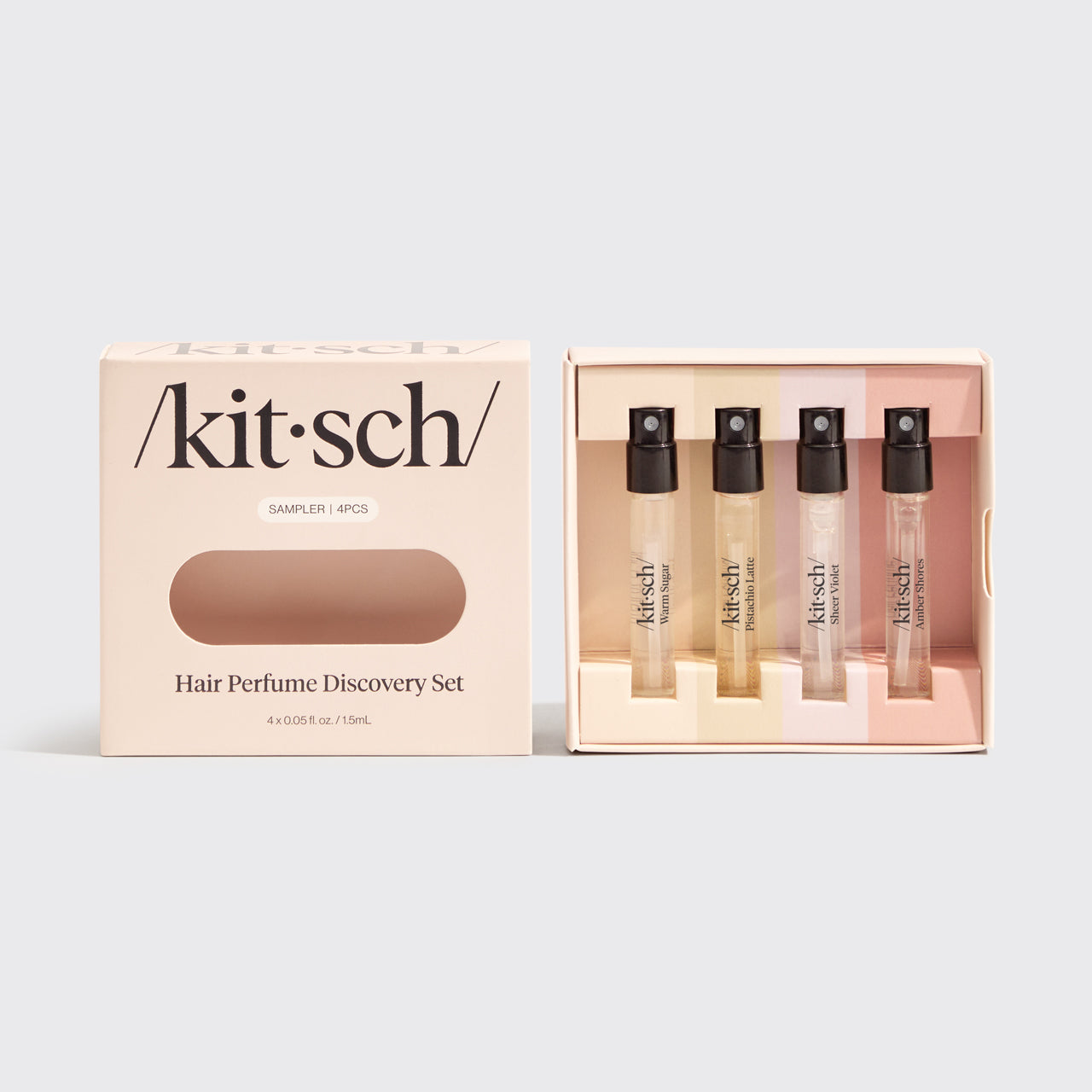 Kitsch Hair & Body Perfume Mist Discovery Set with mini hair perfume bottles on a soft neutral background