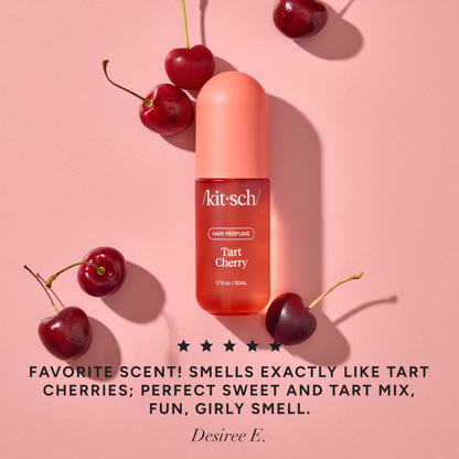 Kitsch Tart Cherry Hair Perfume bottle styled with fresh cherries and a five-star customer review