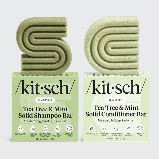 KITSCH Tea Tree & Mint Clarifying Solid Shampoo Bar 3.2oz & Conditioner Bar 2.7oz Combo on white background — both bars labeled CLARIFYING, Shampoo Bar for detoxing, buildup, & oily hair / Conditioner Bar for scalp buildup & oily hair — icons: Bio-Based, Made in USA, Sustainably Sourced, 100 Washes, Cruelty-Free — bottle-free clarifying solid bar set