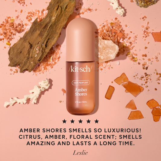 Kitsch Amber Shores Hair Perfume bottle with 5-star customer review, styled with amber resin and sea salt on pink background