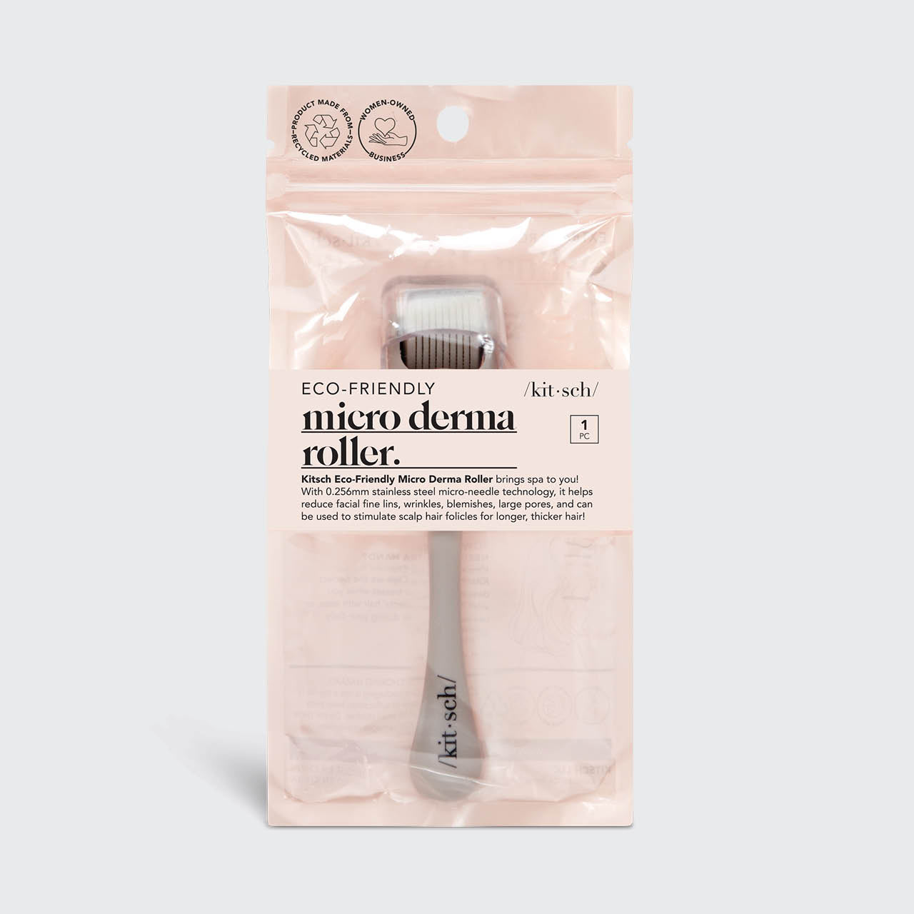 Kitsch Micro Derma Roller in Warm Gray shown with serum bottle for absorption routine