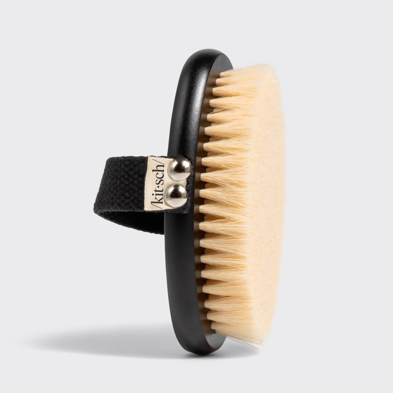 Dry Brush shown in shower context demonstrating waterproof use