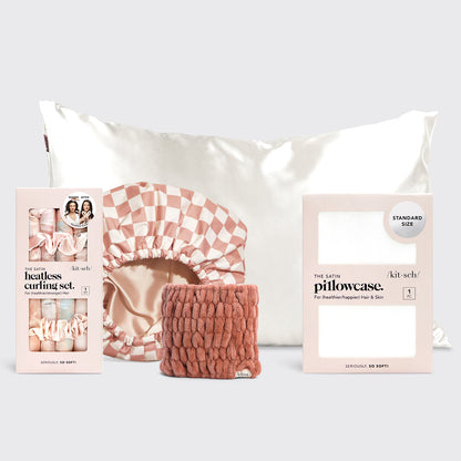 KITSCH Back To College Bundle — flat lay featuring Satin Heatless Curling Set, Satin-Lined Shower Cap in Terracotta Checker, Satin Pillowcase, and Chenille Spa Headband