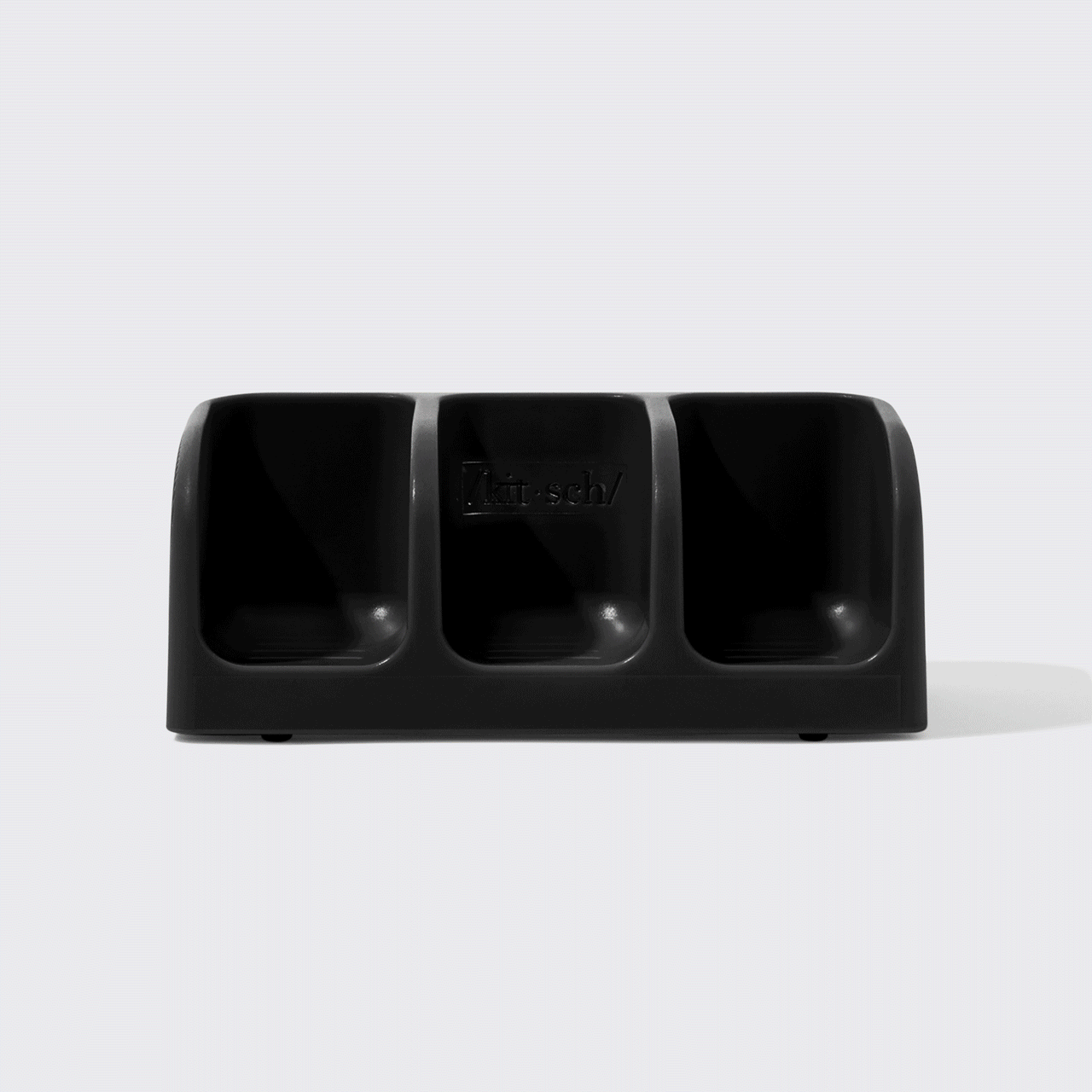 BuildYourOwnBundle-SoapDish-Black GIF showing dry bars being stacked on the soap dish.