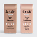 Two bottles of Kitsch Castor Oil Shampoo and Conditioner on a white background