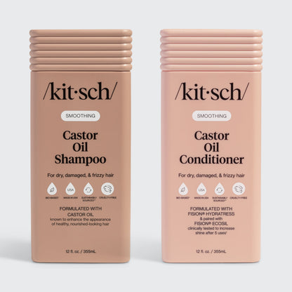 Two bottles of Kitsch Castor Oil Shampoo and Conditioner on a white background