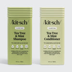 Two bottles of Kitsch Tea Tree & Mint Shampoo and Conditioner on a white background
