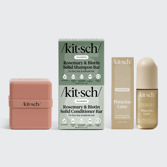 KITSCH Haircare To-Go Bundle — lifestyle flat-lay — shampoo bars, conditioner bars, and travel case contents displayed together — compact and eco-friendly