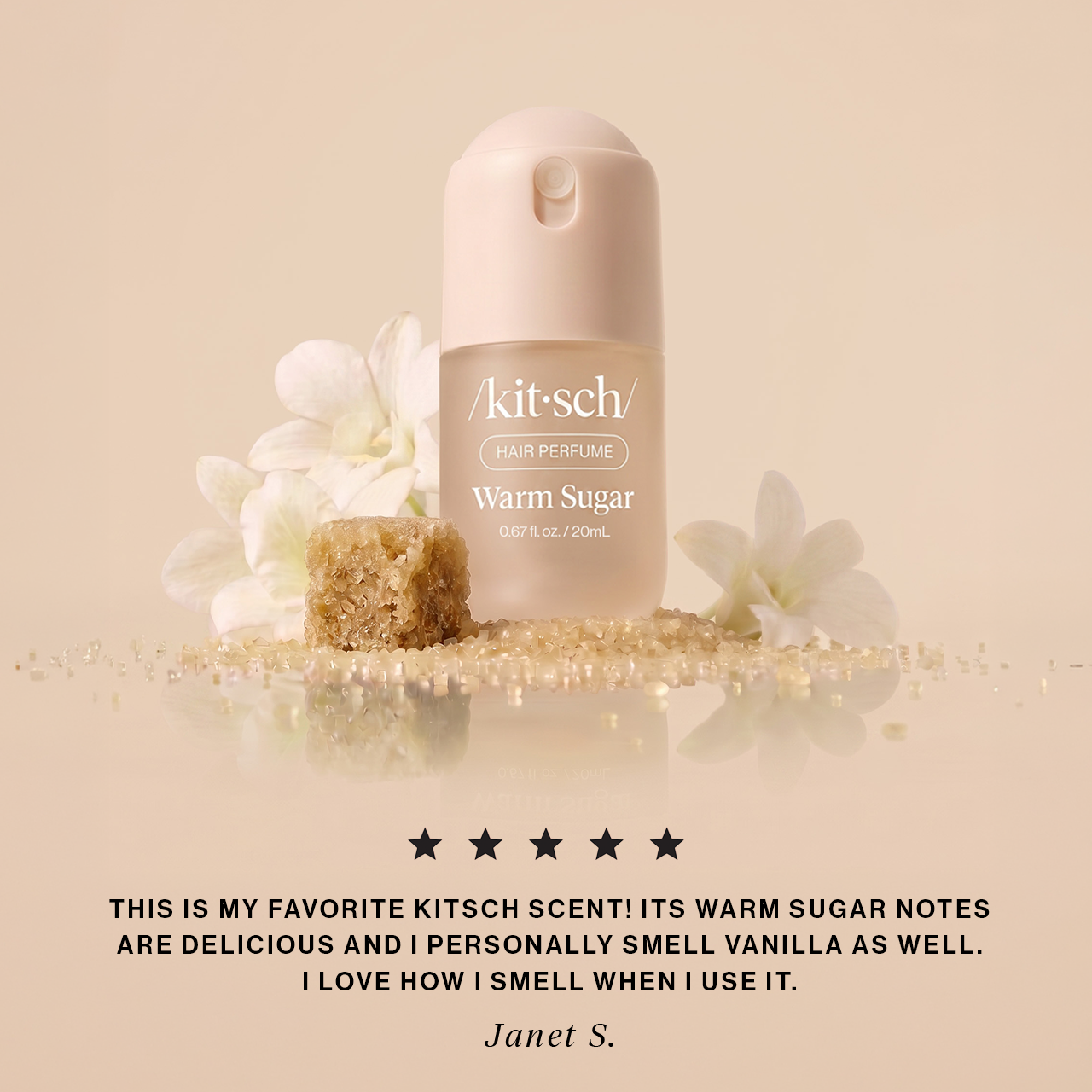 KITSCH Warm Sugar Mini Hair Perfume 5-star review image — cream spray bottle with white blooms and a raw sugar cube — quote from Janet S.: this is my favorite Kitsch scent, warm sugar notes are delicious and I love how I smell when I use it