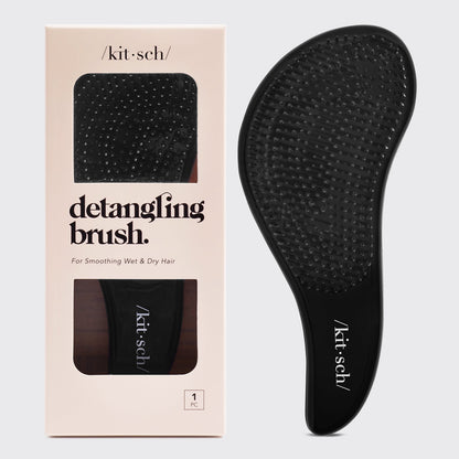 Black Kitsch Detangling Brush on a neutral background