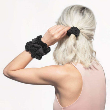 KITSCH Assorted Textured Scrunchies in Black — lifestyle product shot — 5-piece set of mixed-texture scrunchies in rich black tones — gentle on strands