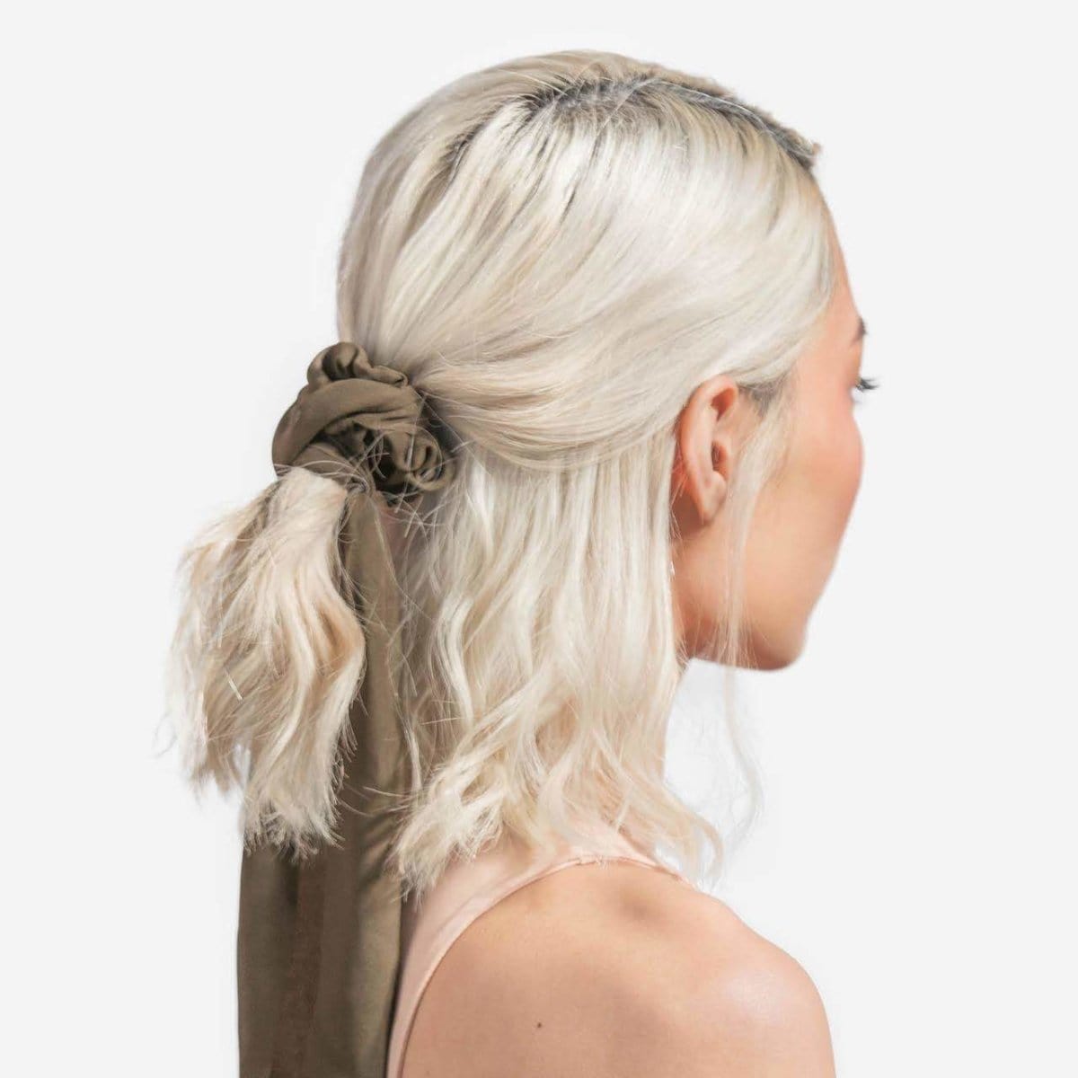 KITSCH Crepe Scarf Scrunchies in Moss — styled product shot of moss green crepe scarf scrunchies — 2pc set, scarf tail adds a chic finishing touch to any hairstyle