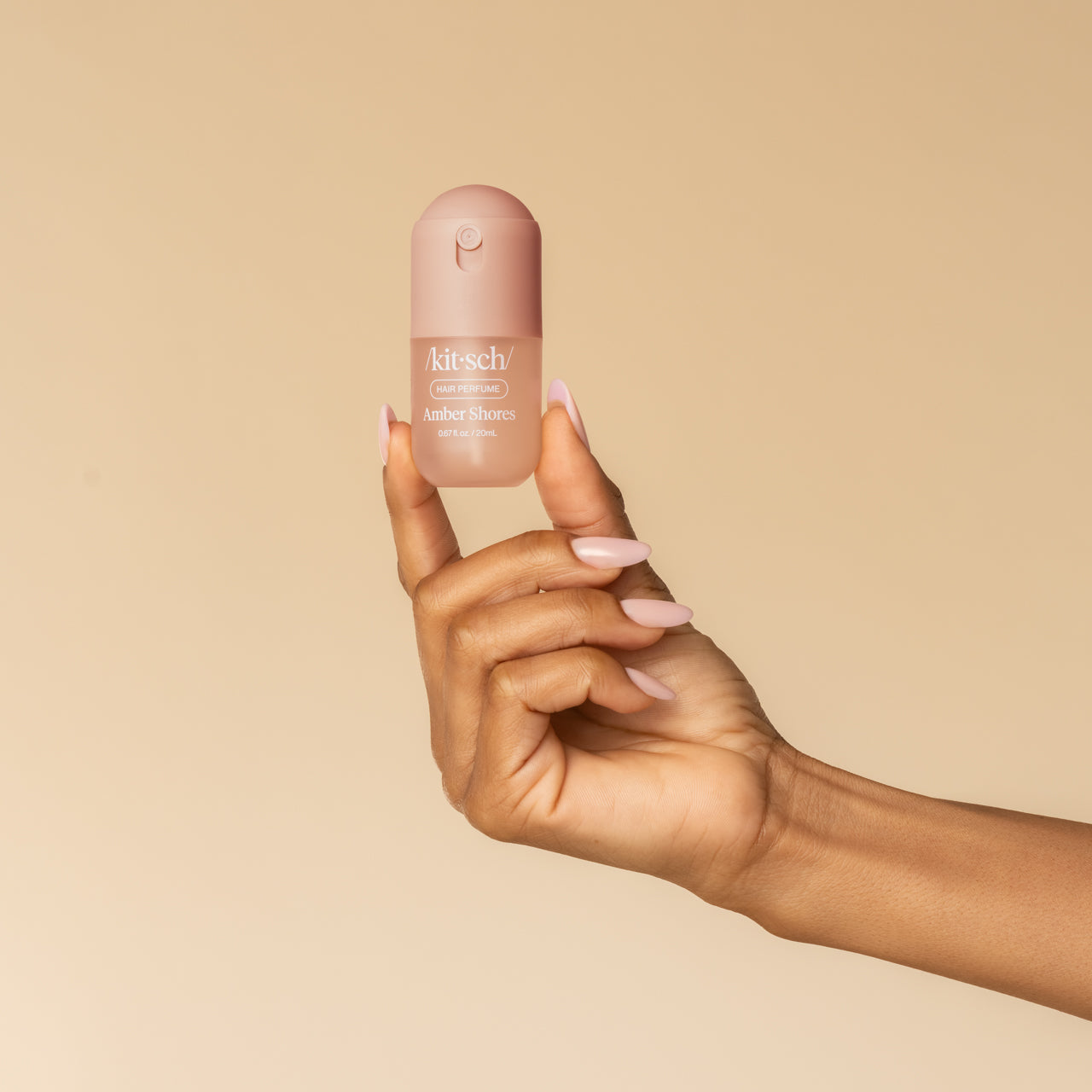 Amber Shores Mini Hair Perfume 20mL - hand holding bottle
