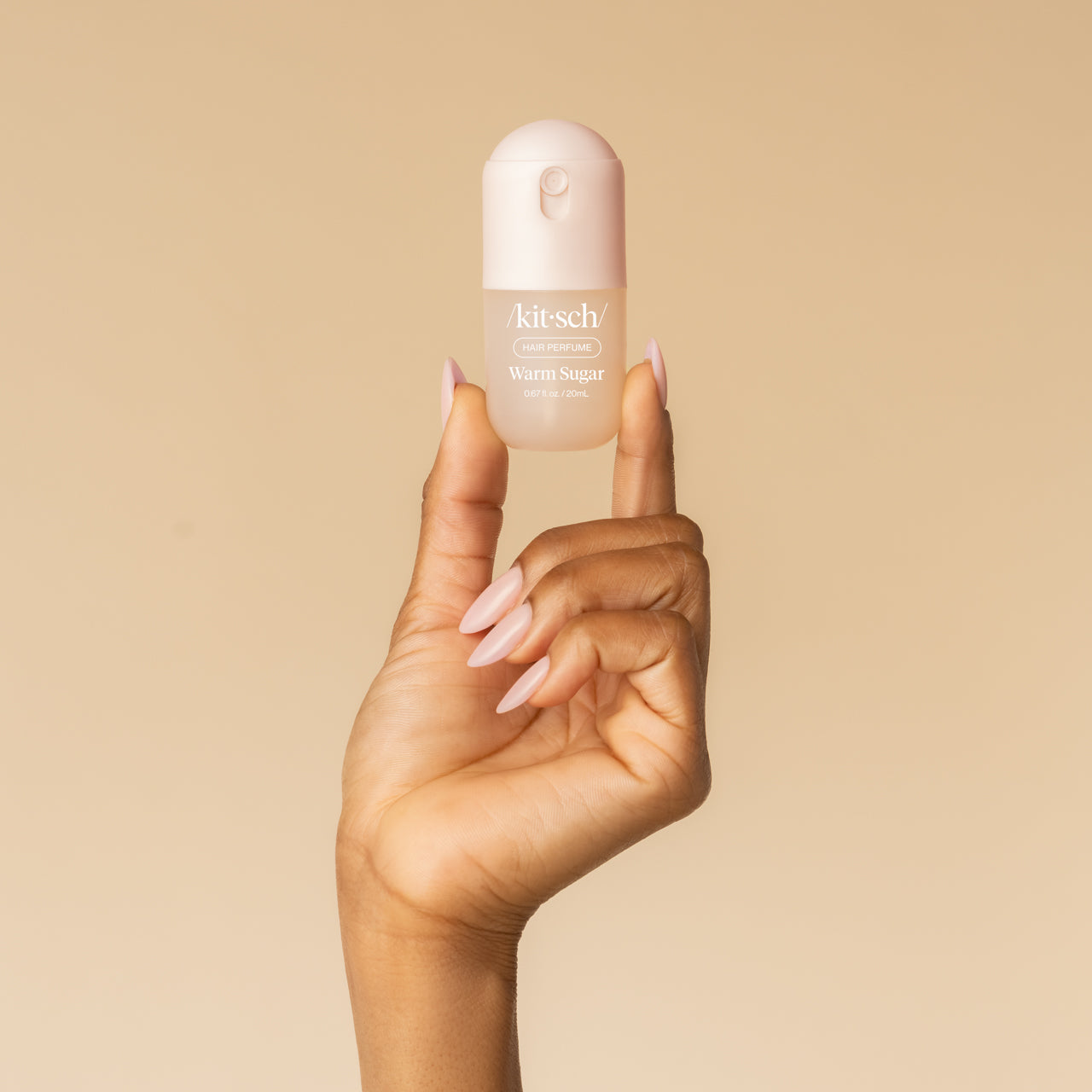 Warm Sugar Mini Hair Perfume 20mL - hand holding bottle